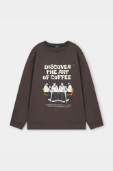 Brown sweatshirt with graphic and text on a light gray background