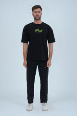 Trendy oversized black t-shirt for men with a bold biker-inspired graphic, ideal for casual and urban wear. - Ride Fast Oversized T-Shirt - Xea Clothing