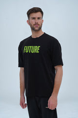 lack oversized drop-shoulder T-shirt with "FUTURE" printed in bold green letters on the front.