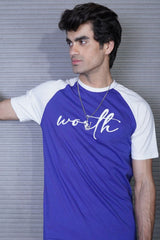 Man wearing a blue and white t-shirt with 'worth' printed on it against a metallic background