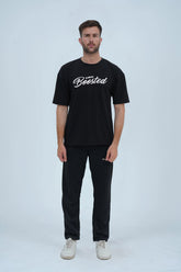 Automotive-inspired oversized black T-shirt from XEA Clothing, designed for off-road and street racing fans with 'Go Fast or Sleep' lettering. - Boosted Oversized T-Shirt - Xea Clothing - Boosted Oversized T-Shirt - Xea Clothing