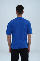 Essential sapphire blue drop shoulder T-shirt for men – oversized fit, premium cotton, and a bold yet stylish look.