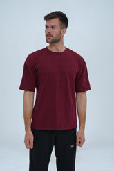 Maroon oversized drop shoulder T-shirt for Unisex. relaxed fit, breathable cotton, and perfect for casual streetwear.