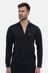 Man wearing a black zip-up sweatshirt on a white background