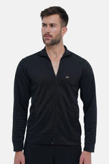 Man wearing a black zip-up sweatshirt on a white background