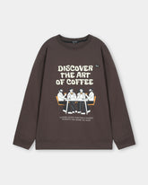 Brown sweatshirt with 'Discover the Art of Coffee' text and graphic on a light gray background