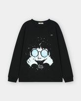 Black sweatshirt with a graphic design of a person wearing glasses and text 'BEYOND THE EYES' on a light gray background.