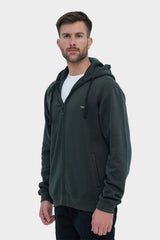 Man wearing a green hoodie on a white background