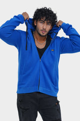 Person wearing a blue hoodie on a white background