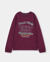 Maroon sweatshirt with 'Good Vibes Worldwide' text and cartoon characters on a light gray background