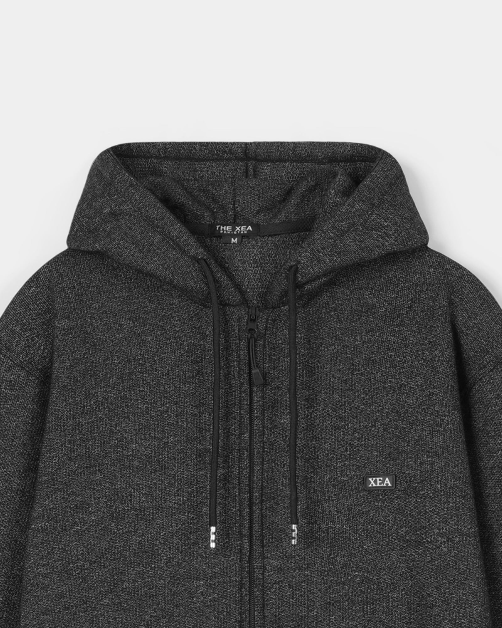 Dark gray hoodie with brand logo on a light gray background