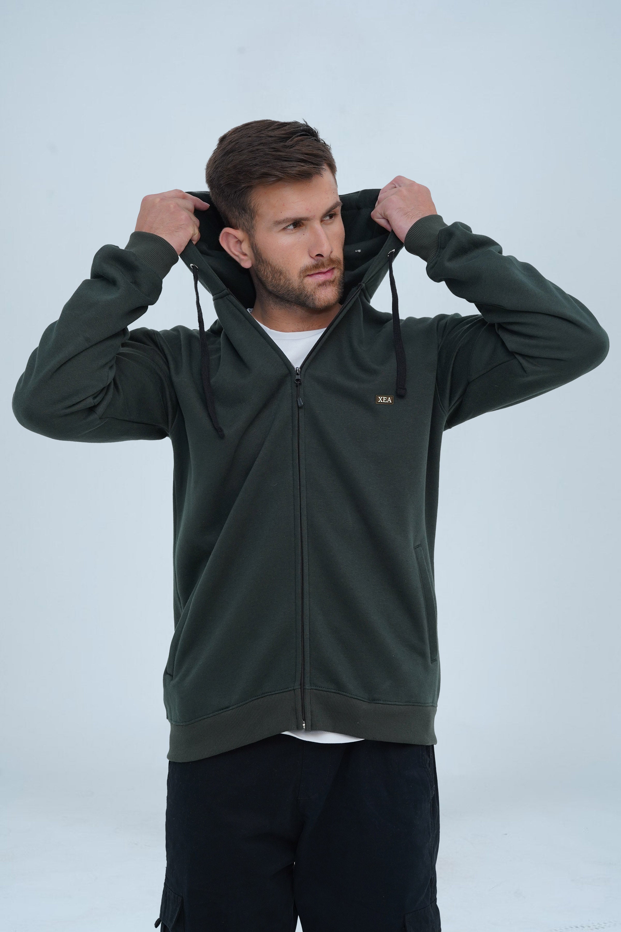 Experience luxurious warmth and style with Xea men's racing green zip up hoodie. Elevate your fashion sense by zipping it up or leaving it open.