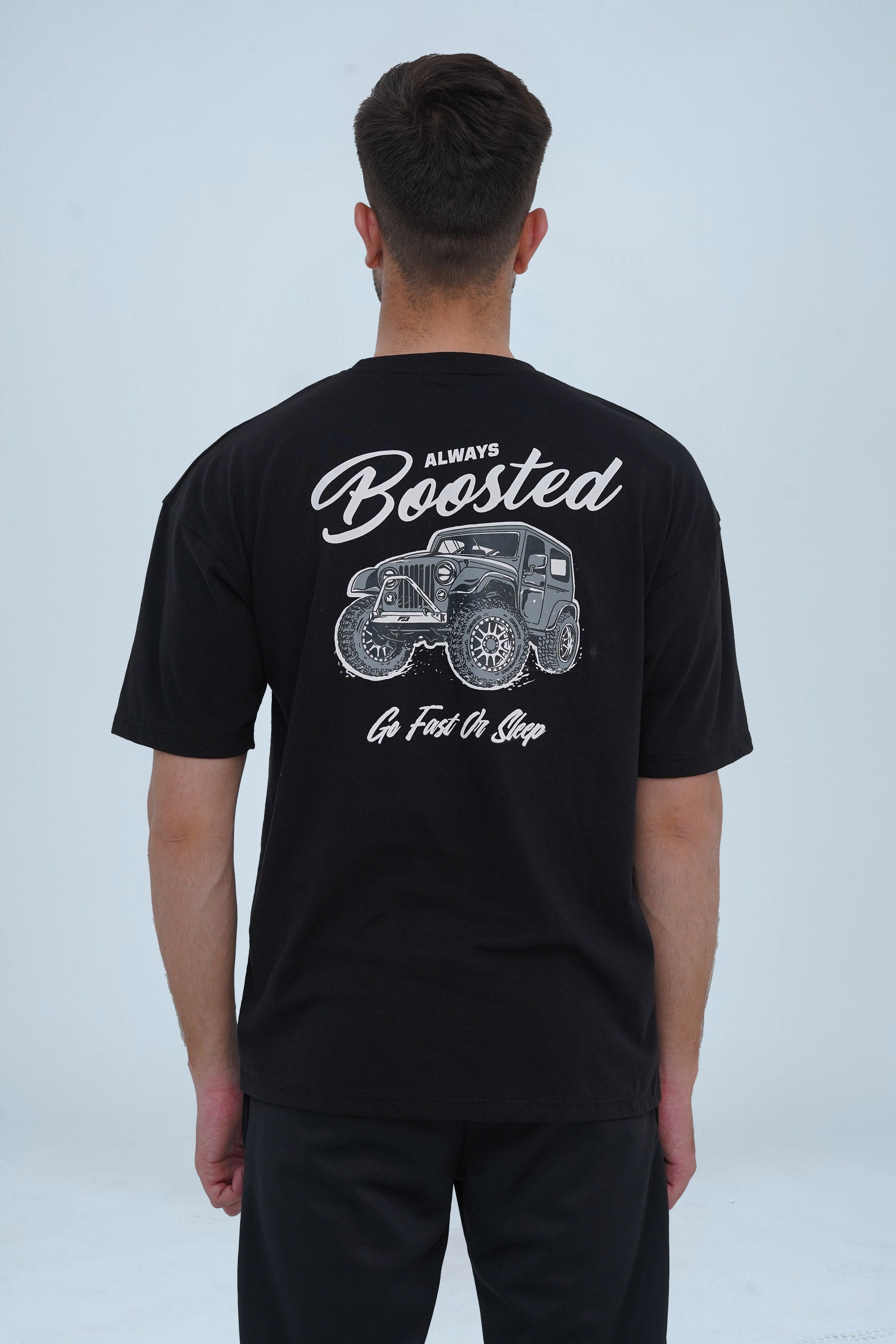 Xea clothing Black oversized drop-shoulder T-shirt with 'Always Boosted' print—perfect for car lovers, streetwear fans, and off-road enthusiasts.