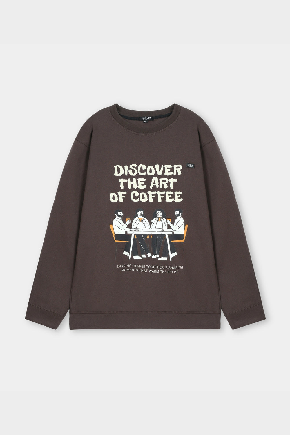 Brown sweatshirt with graphic and text on a light gray background