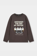 Brown sweatshirt with graphic and text on a light gray background