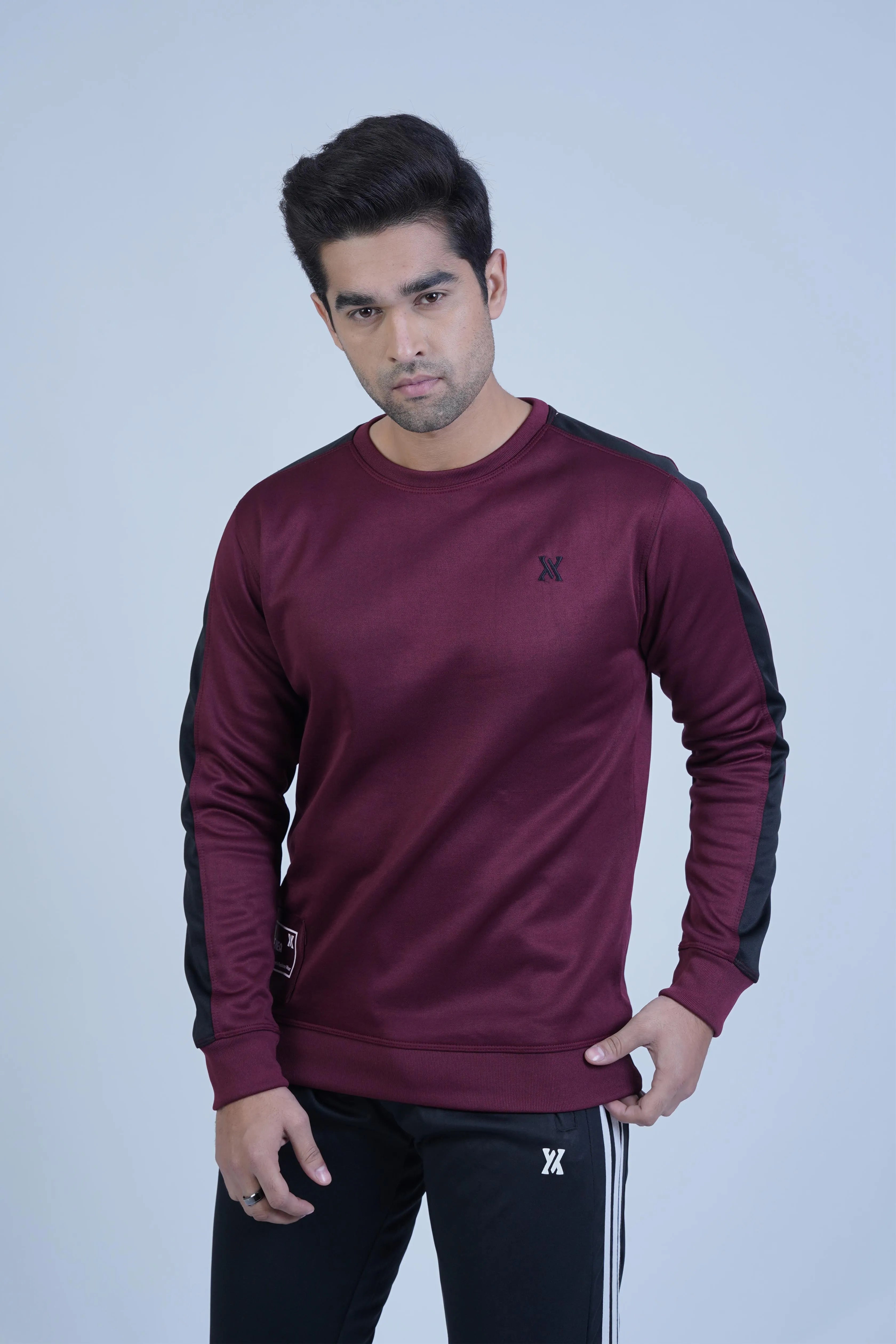 Stay cozy and stylish this winter with our Maroon Sweatshirt! Premium materials and a perfect fit will keep you confident and warm. The bold black sleeve panel adds an adventurous touch to your wardrobe. -  Bold Sleeves Maroon Sweatshirt - Xea Clothing -  Bold Sleeves Maroon Sweatshirt - Xea Clothing