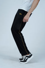Step up your casual style with these Black Joggers for Men with Yellow Accents. Designed with a unique yellow back panel, yellow side stitching, and a hidden zip pocket, these joggers offer both style and secure storage. Whether for the gym, outdoor adventures, or relaxed days, these joggers bring comfort and a bold look to any outfit.