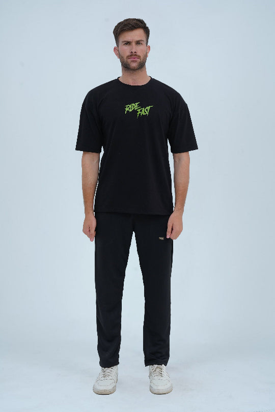 Trendy oversized black t-shirt for men with a bold biker-inspired graphic, ideal for casual and urban wear. -  Ride Fast Oversized T-Shirt - Xea Clothing