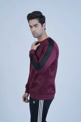 Stay cozy and stylish this winter with our Maroon Sweatshirt! Premium materials and a perfect fit will keep you confident and warm. The bold black sleeve panel adds an adventurous touch to your wardrobe. -  Bold Sleeves Maroon Sweatshirt - Xea Clothing -  Bold Sleeves Maroon Sweatshirt - Xea Clothing