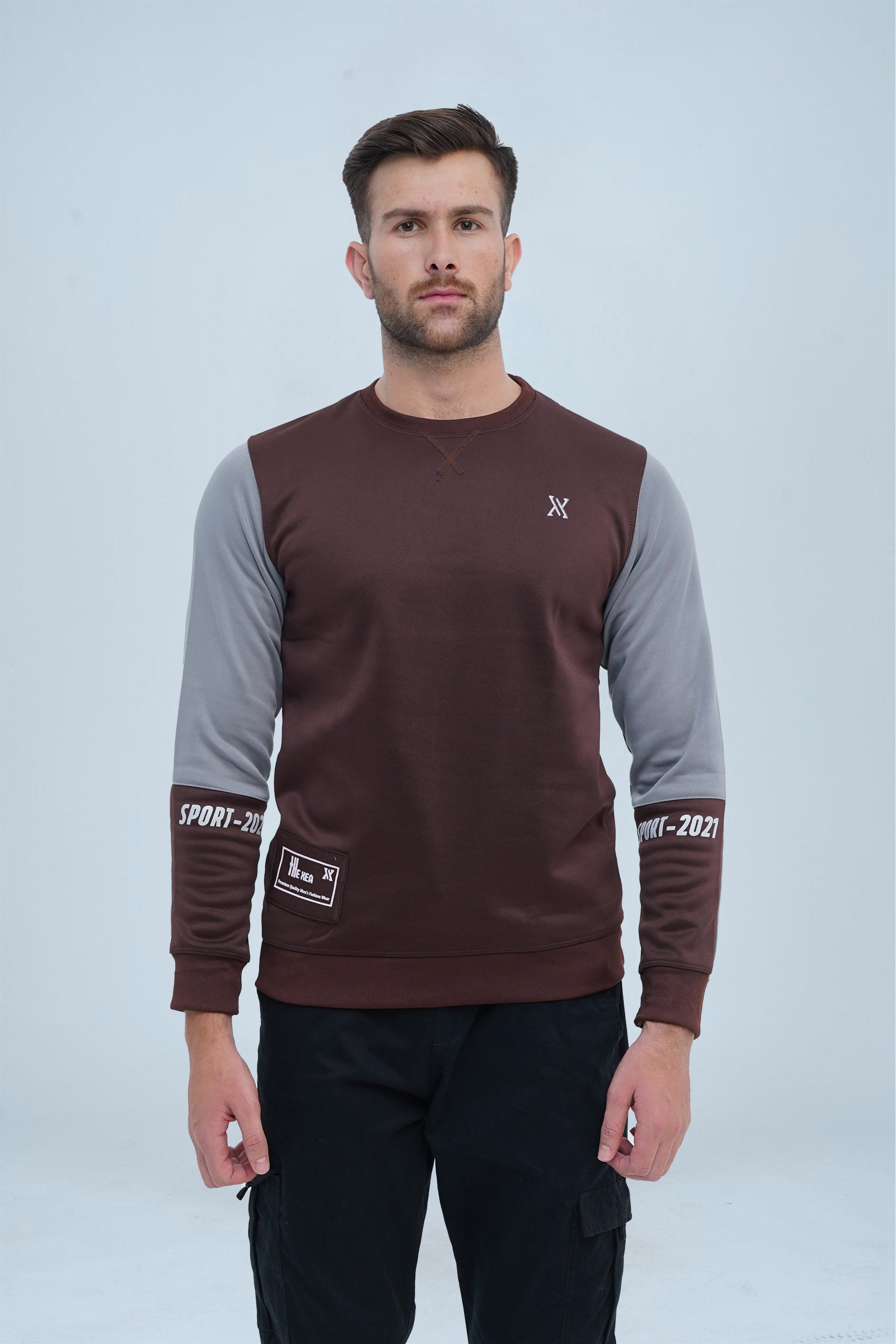 Casual Brown Sweatshirt with Unique Sleeve Details, perfect for adding flair to your everyday outfits