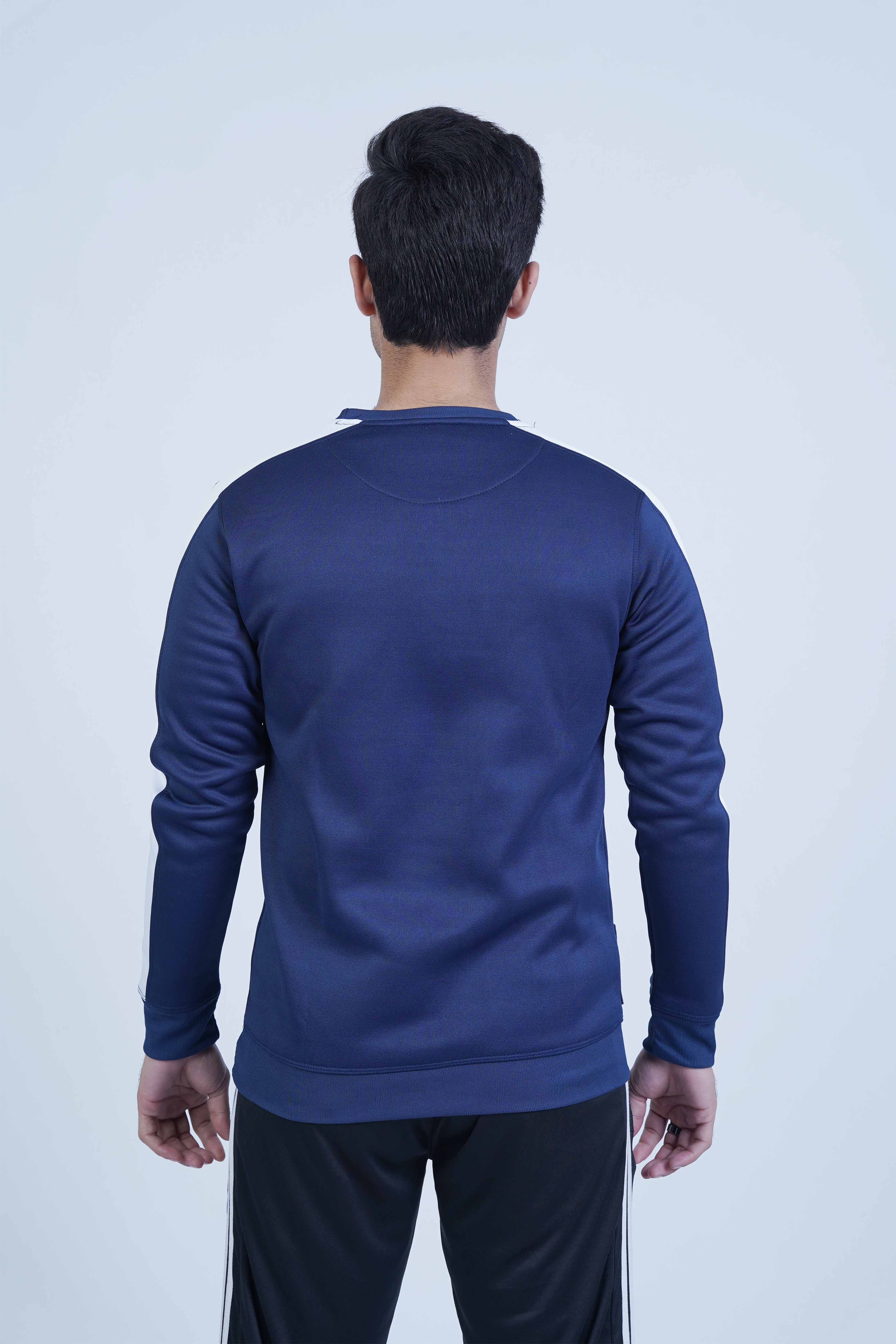 Get ready for winter with our Reglan Blue Men's Sweatshirt! Experience ultimate comfort and style with high-quality materials and a perfect fit. The white panel on the sleeves adds a bold touch to your wardrobe.