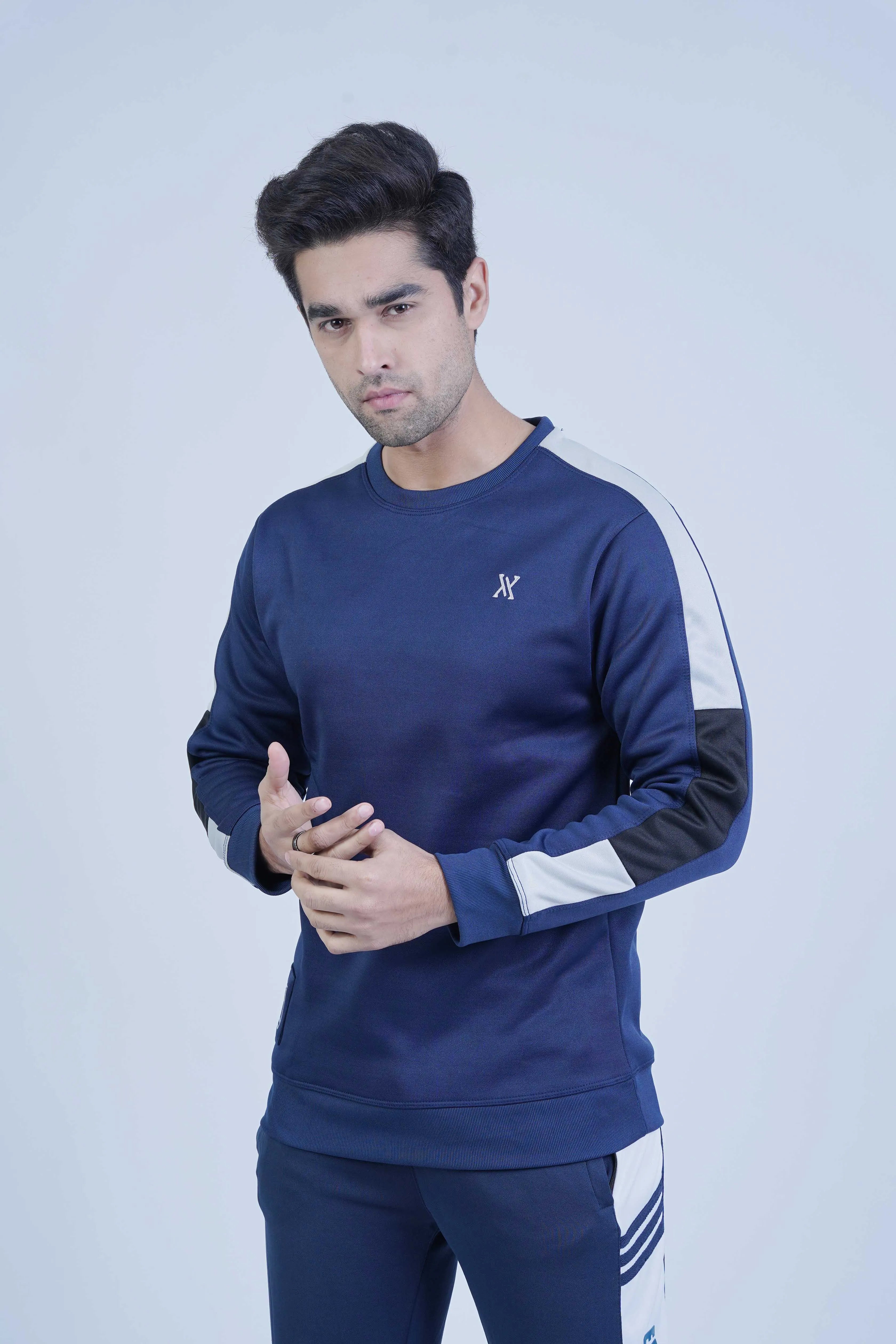 Navy sweatshirt with stylish ash grey and black stripes on the sleeves, creating a sporty and modern appearance. -  Striking Sleeves Navy Sweatshirt - Xea Clothing -  Striking Sleeves Navy Sweatshirt - Xea Clothing