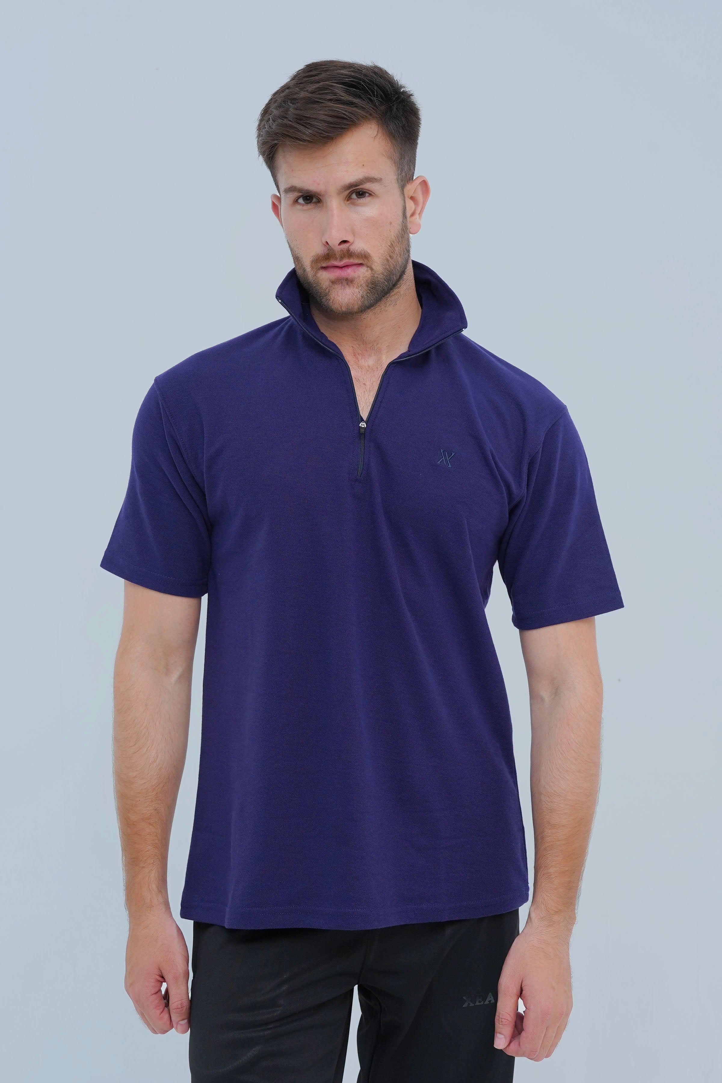 Upgrade your casual look with Xea Pique Polo Shirt in deep purple. Modern zip placket and high-quality fabric for a sophisticated and stylish appearance.