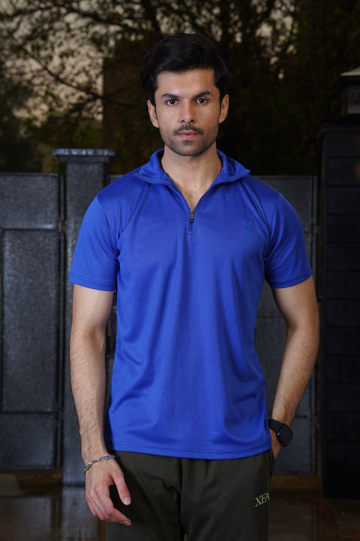 Upgrade your look with our Royal Blue Plain Pique Polo Shirt. Made with high-quality materials and a zip placket, this shirt exudes a classy and refined style.