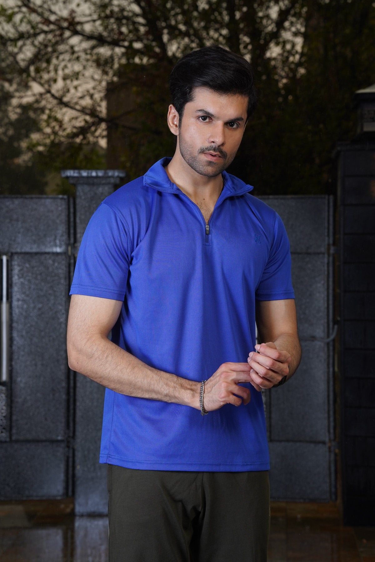 Upgrade your look with our Royal Blue Plain Pique Polo Shirt. Made with high-quality materials and a zip placket, this shirt exudes a classy and refined style.