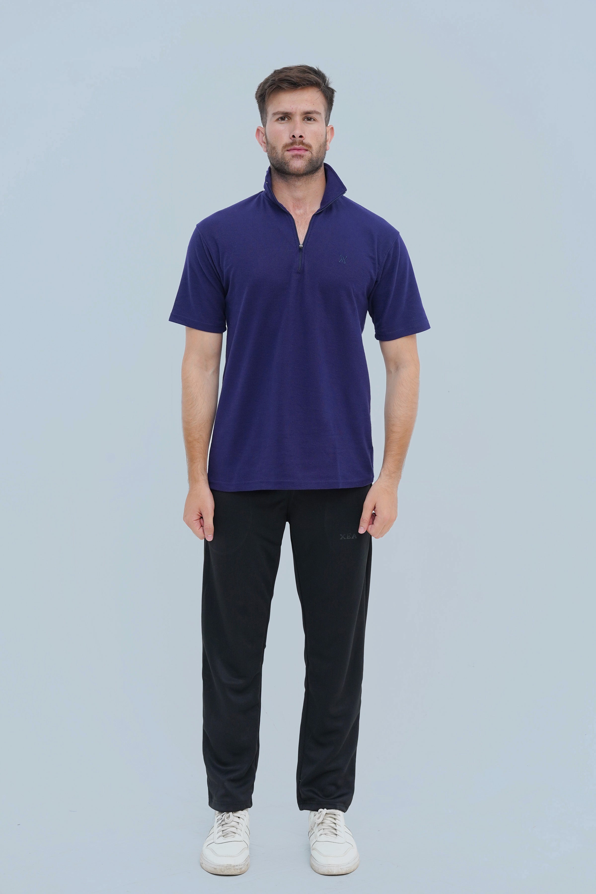 Upgrade your casual look with Xea Pique Polo Shirt in deep purple. Modern zip placket and high-quality fabric for a sophisticated and stylish appearance.