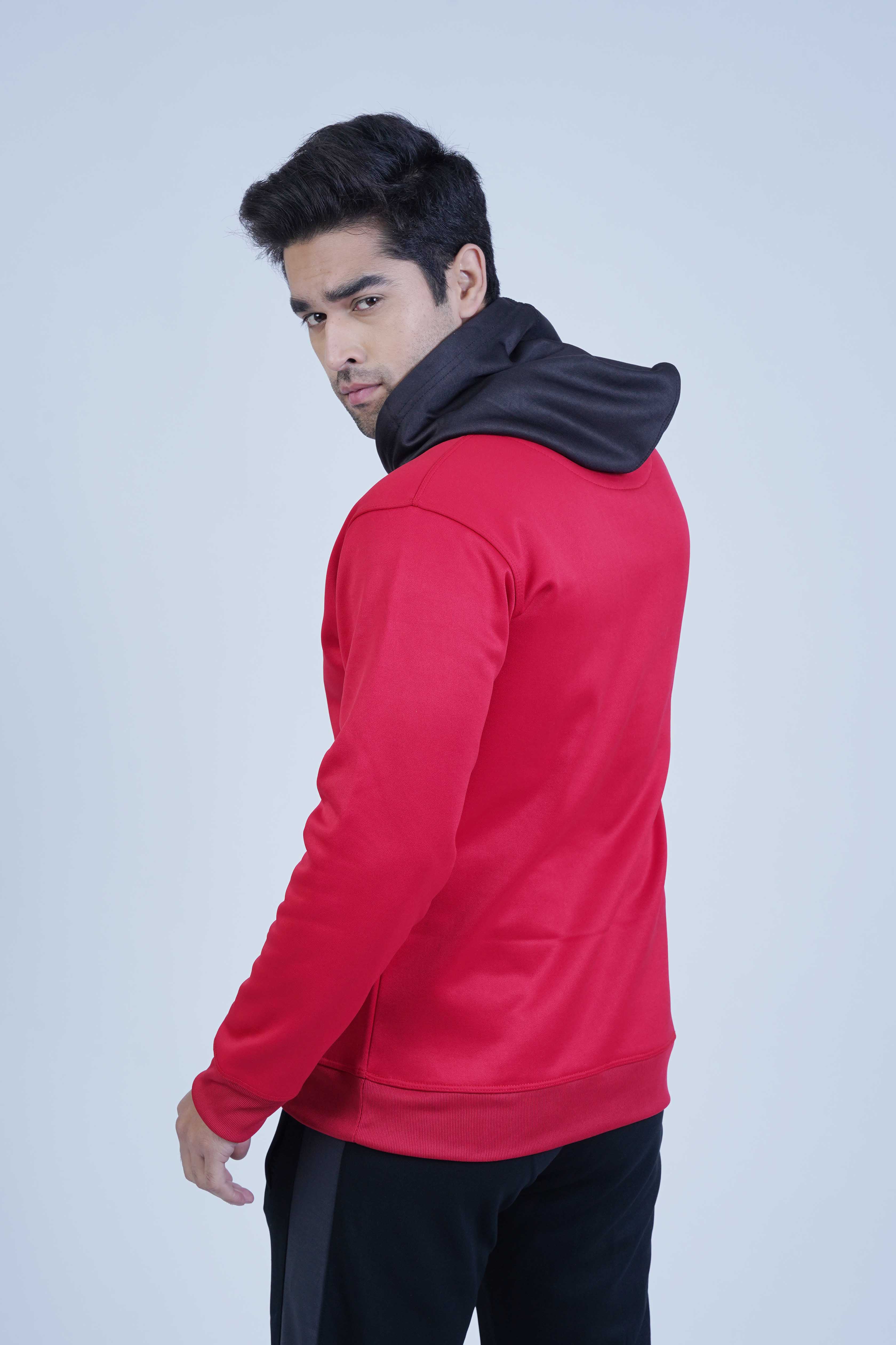 Get the perfect balance of comfort and style with this red and black pullover hoodie! Made with a red body, black hood, and front pocket, it's ideal for daily wear.