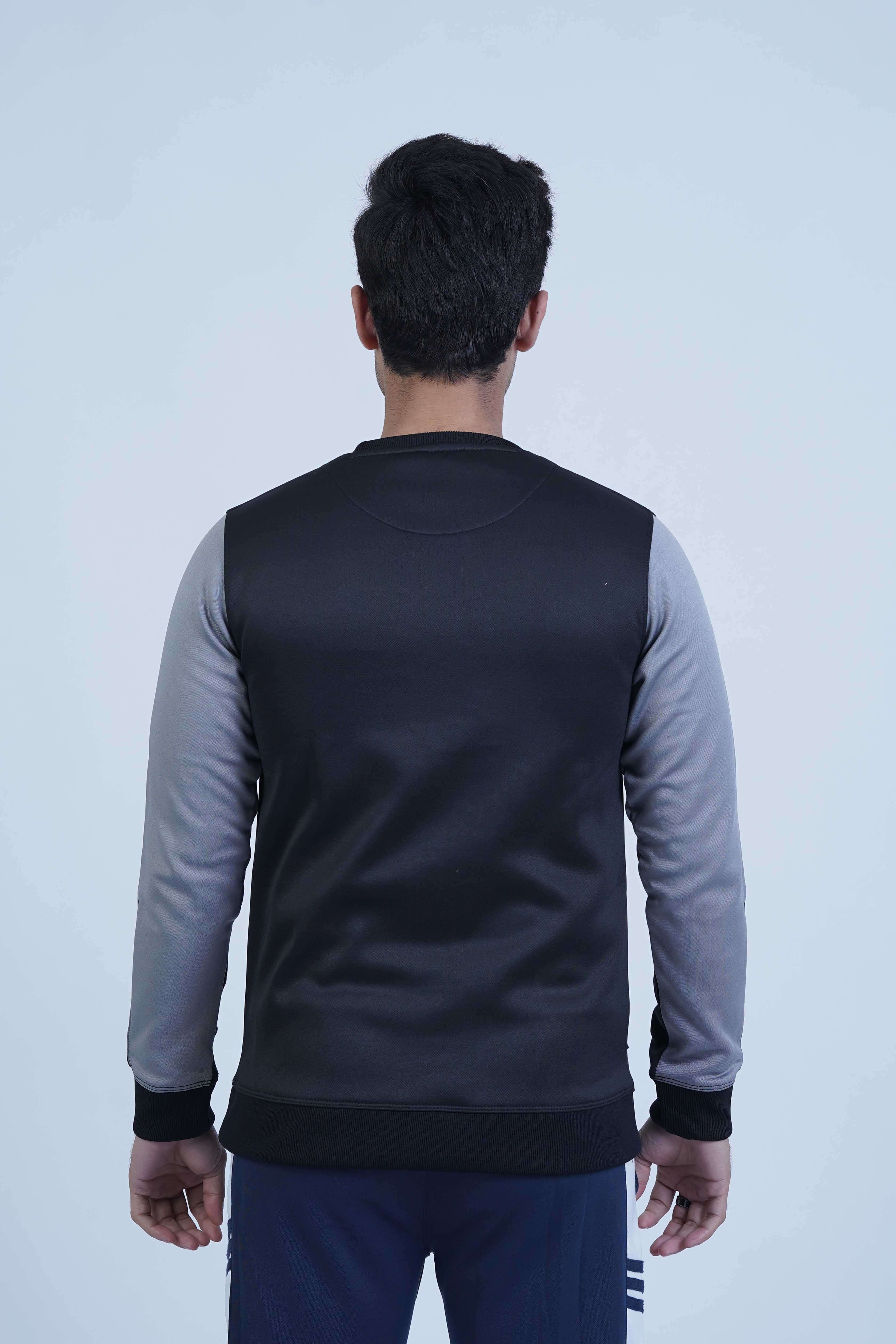 Add a modern touch to your wardrobe with this stylish black sweatshirt for men. Featuring eye-catching contrast sleeves, it's perfect for elevating your casual look. You can easily pair it with jeans or joggers and create a versatile and trendy outfit.