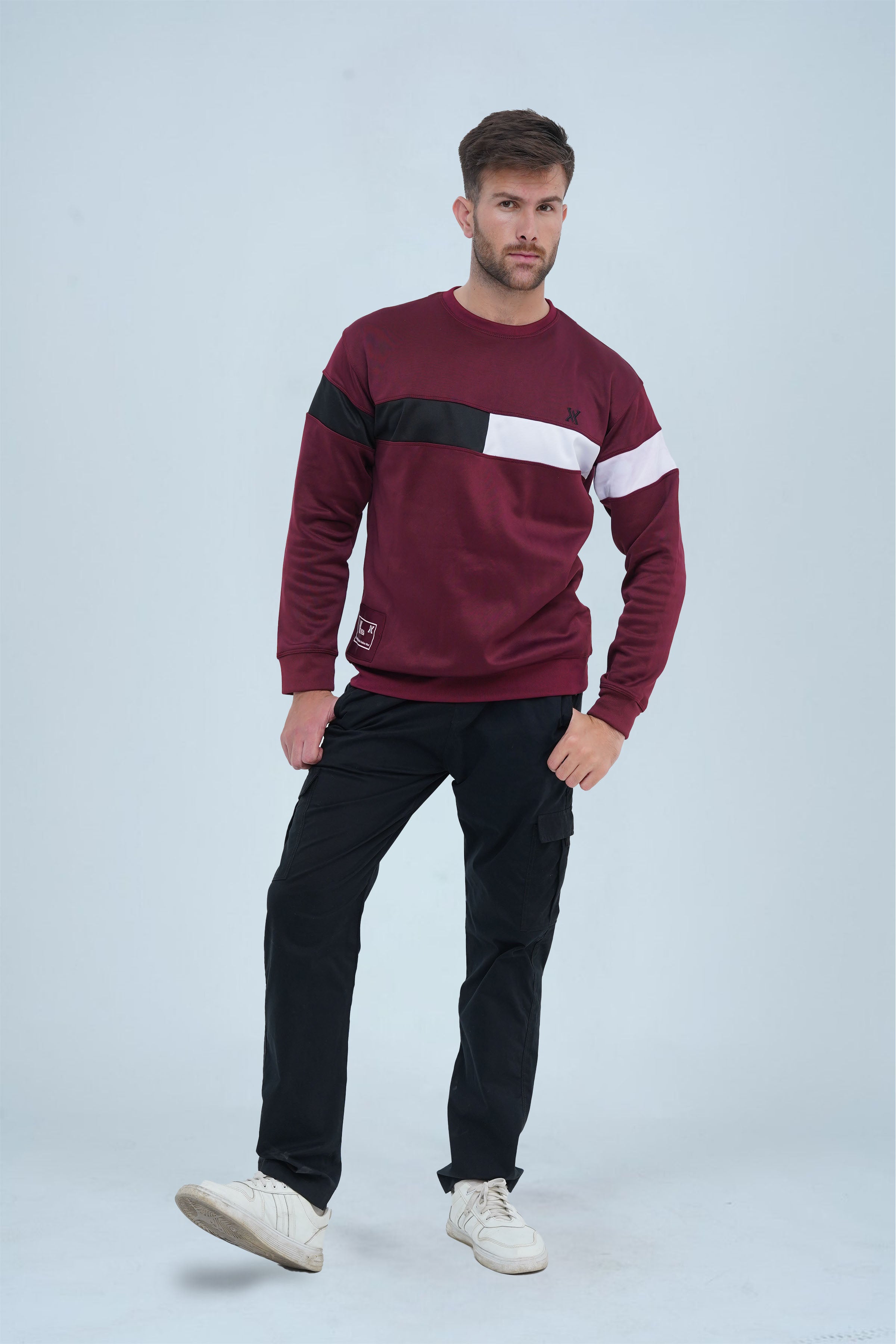 Maroon sweatshirt with a bold black and white chest stripe, providing a sleek and modern design