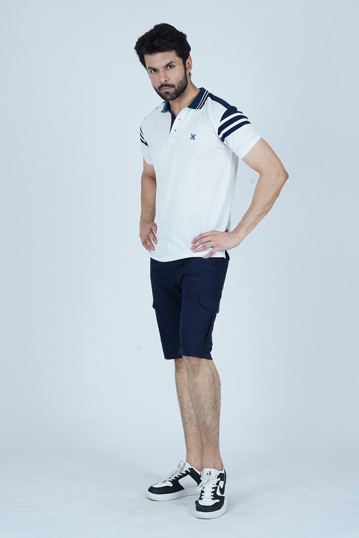 Xea Color Block Men's White Polo Shirt. This comfortable and stylish piece has a Urban design with a Contrast collar and Shoulder.