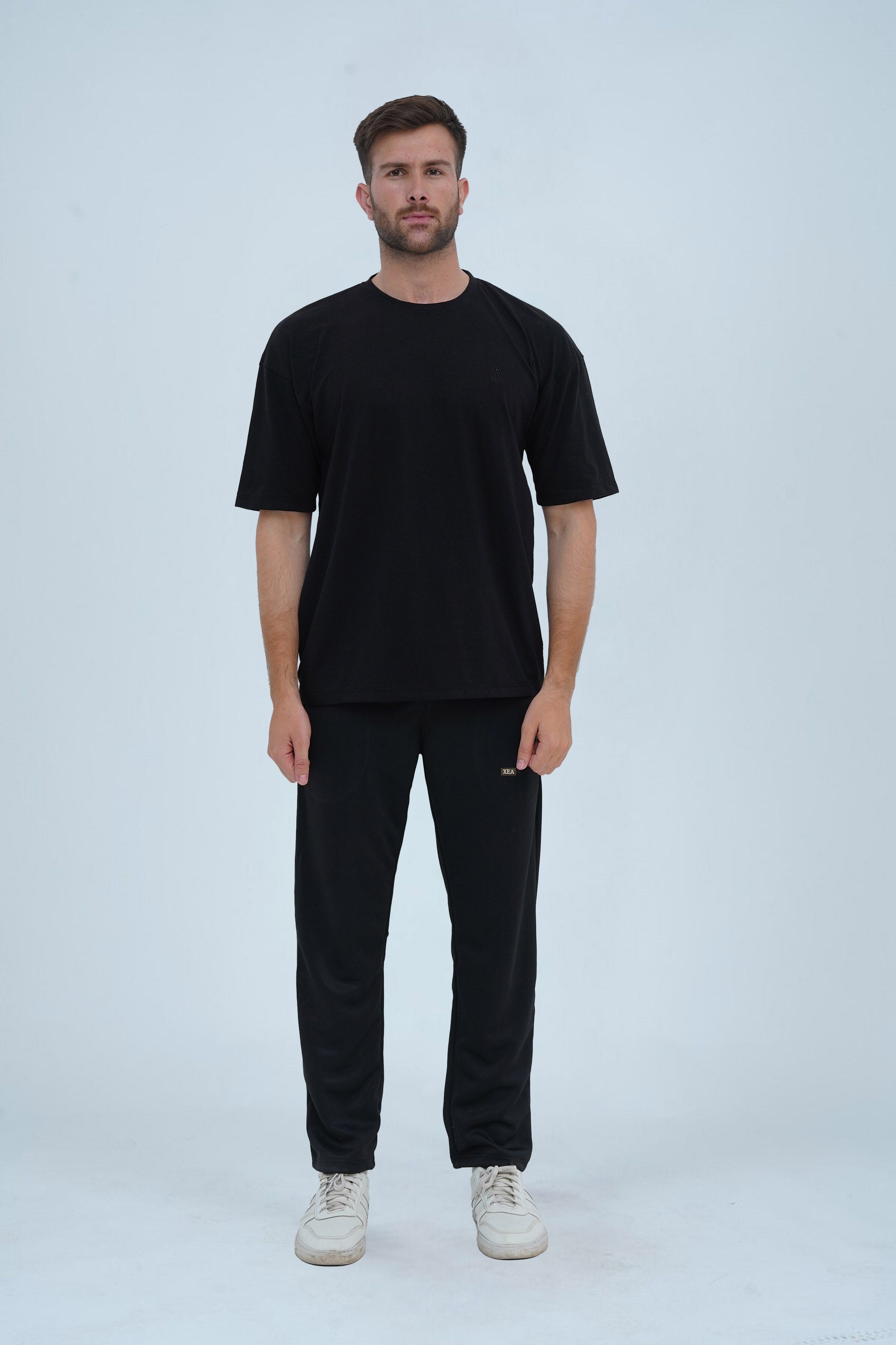 Black oversized drop shoulder T-shirt for men – relaxed fit, soft cotton, and perfect for casual and streetwear style.