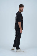 Cristiano Ronaldo-inspired oversized drop-shoulder t-shirt by XEA, featuring soft cotton fabric, a statement CR7 print on the front, and a dynamic back design of Ronaldo in action.