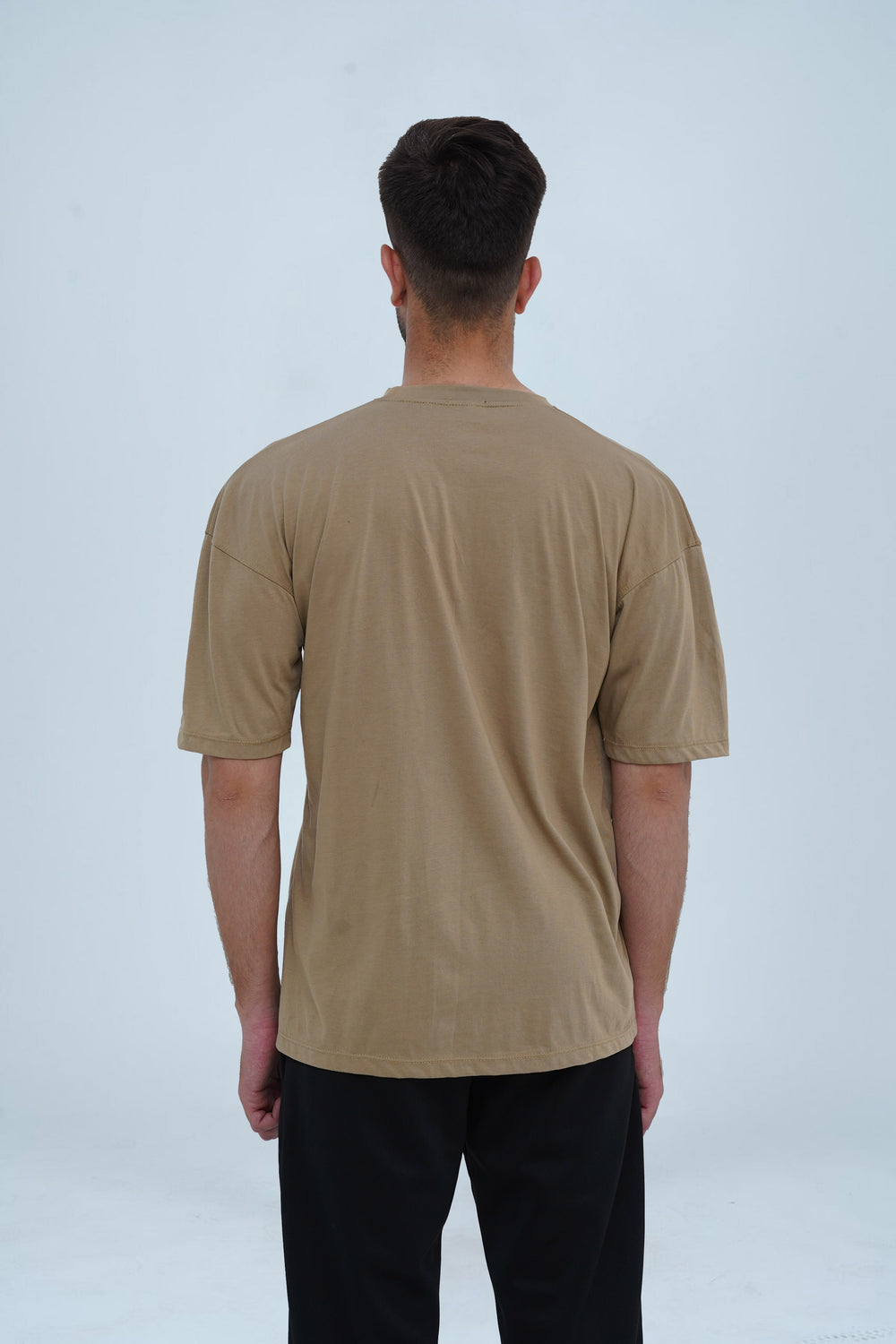 Earth brown drop shoulder oversized T-shirt – breathable fabric, minimal design, and a modern streetwear essential.