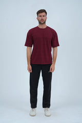Essential maroon drop shoulder T-shirt for unisex oversized fit, premium cotton, and a modern street style look.