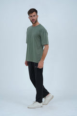 Fresh green drop shoulder oversized T-shirt – breathable fabric, minimal design, and a modern streetwear essential.