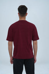 Men’s maroon oversized T-shirt with a drop shoulder design – trendy, comfortable, and ideal for urban fashion. -  Maroon Oversized T-Shirt - Xea Clothing
