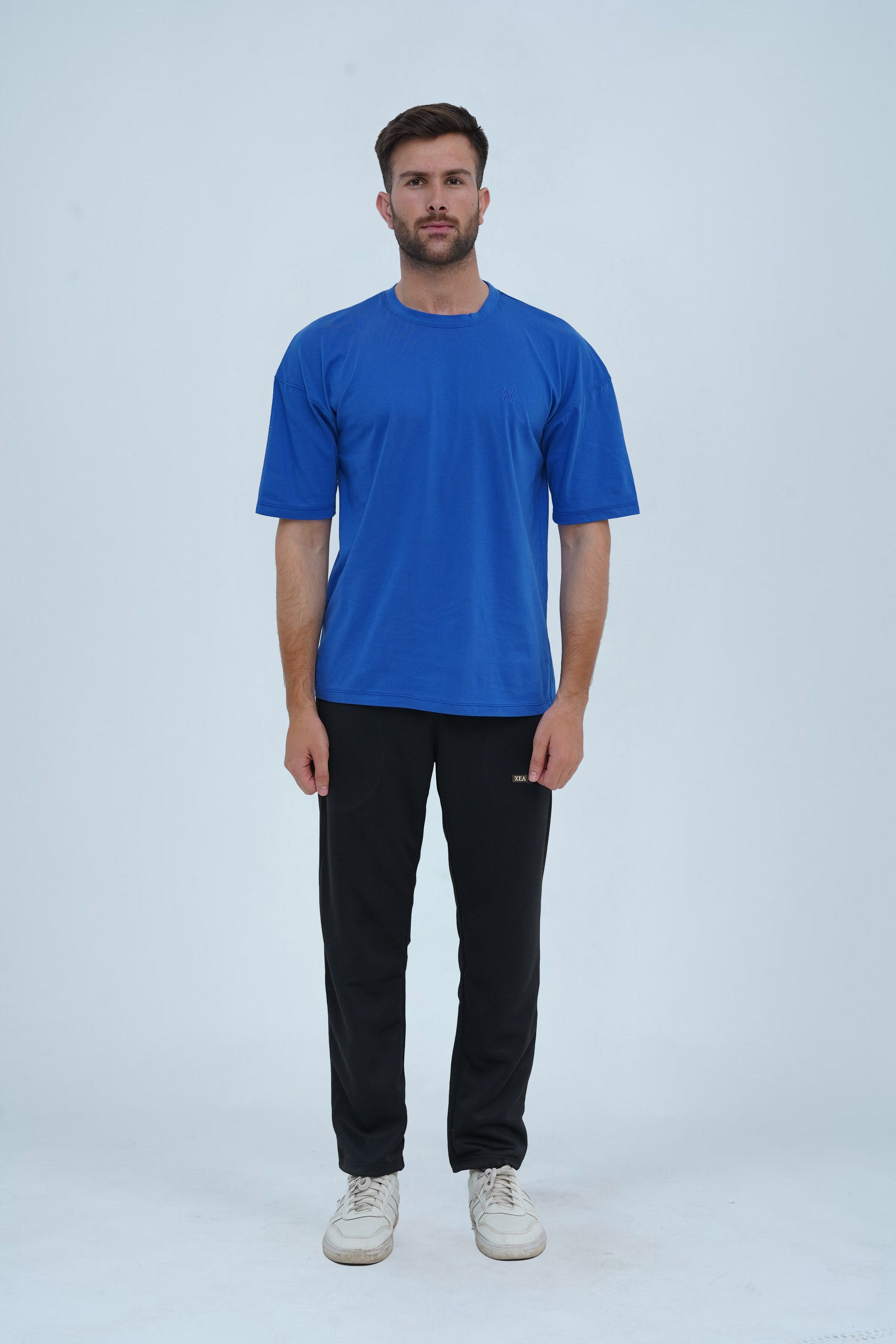 Sapphire blue oversized drop shoulder T-shirt for men – relaxed fit, soft cotton, and perfect for casual and streetwear looks.