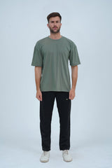 Summer green oversized drop shoulder T-shirt for men – relaxed fit, soft cotton, and perfect for casual and streetwear looks.
