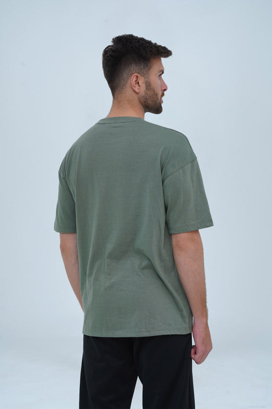 Men’s summer green oversized T-shirt with a trendy drop shoulder fit – ideal for urban fashion, layering, and everyday comfort.