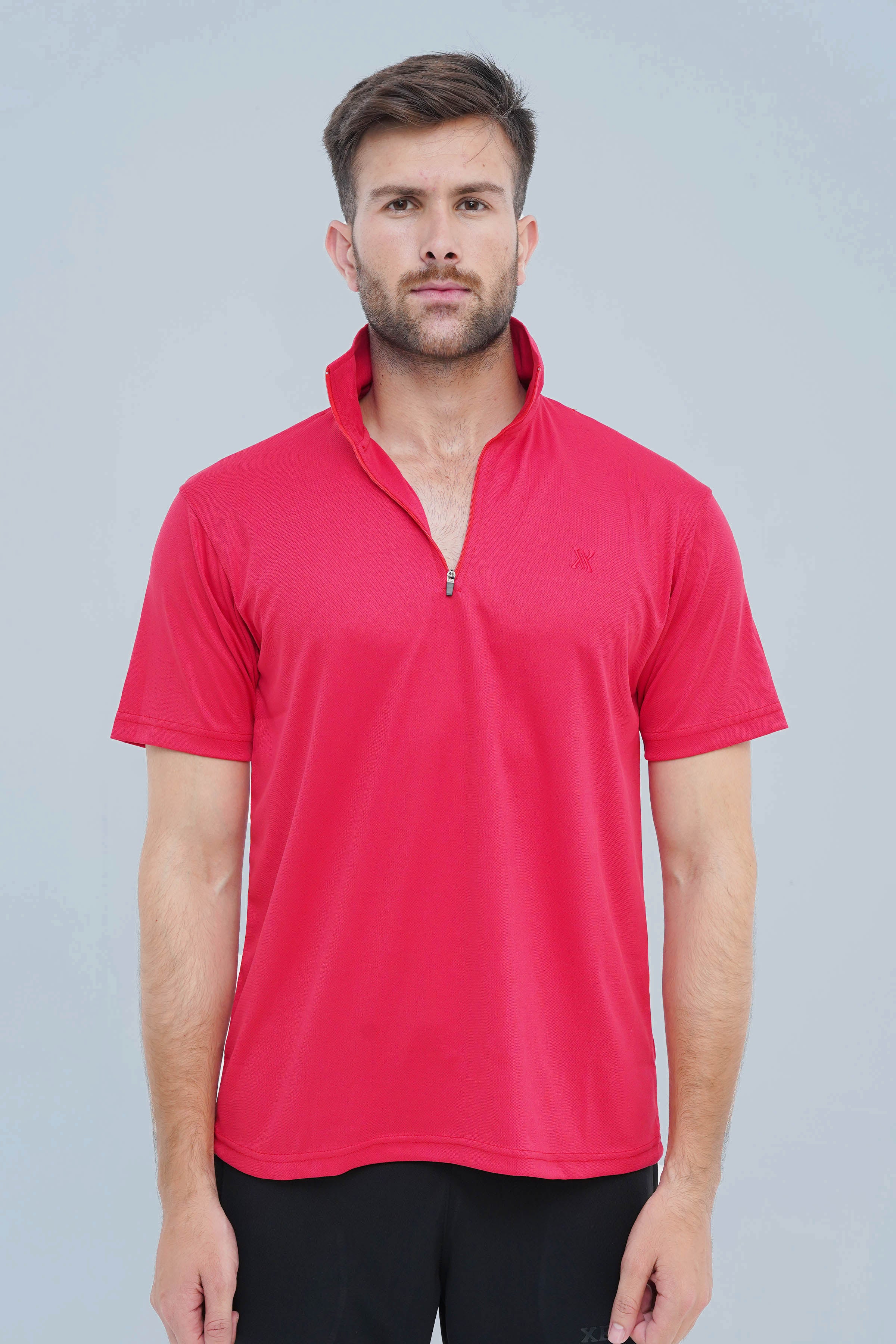 Xea Pique Polo Shirt in Soft Red. Timeless style meets high-quality fabric and a zip closure.