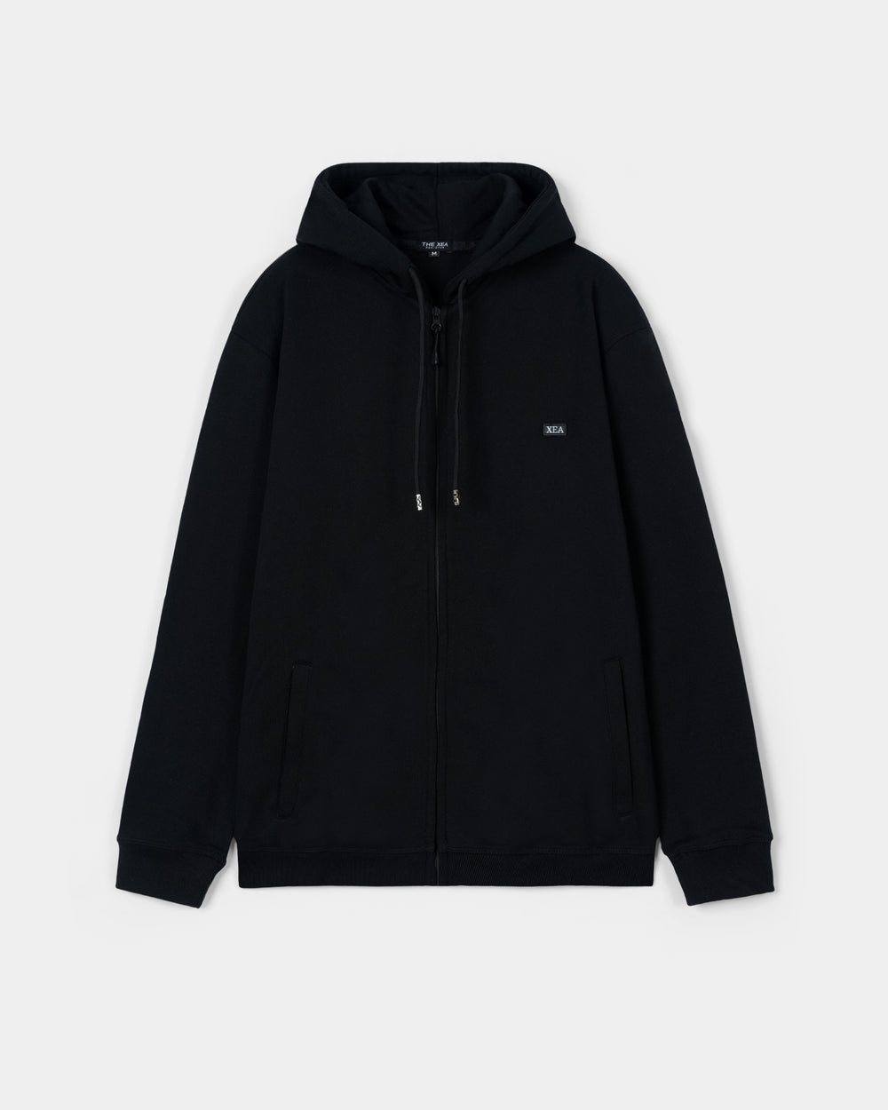 Black hoodie on a light gray background