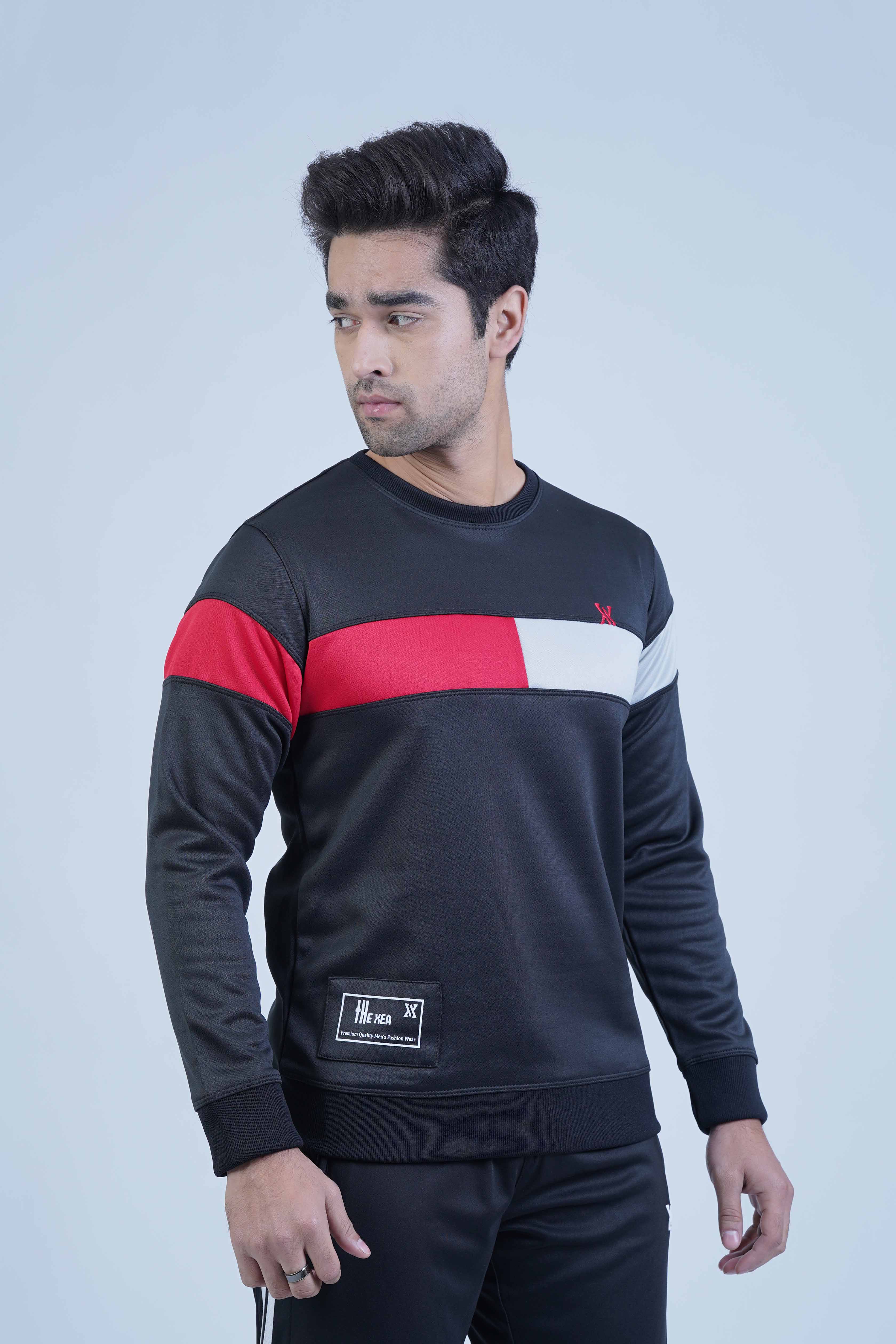 Upgrade your style with this trendy black sweatshirt for men! The modern red and white color block design is sure to inspire you daily.