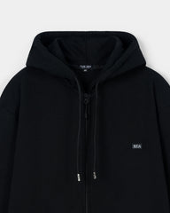 Black hoodie with a brand logo on a white background