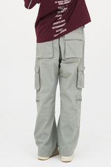 Light grey cargo pants for men in Pakistan with baggy streetwear fit and zip detail