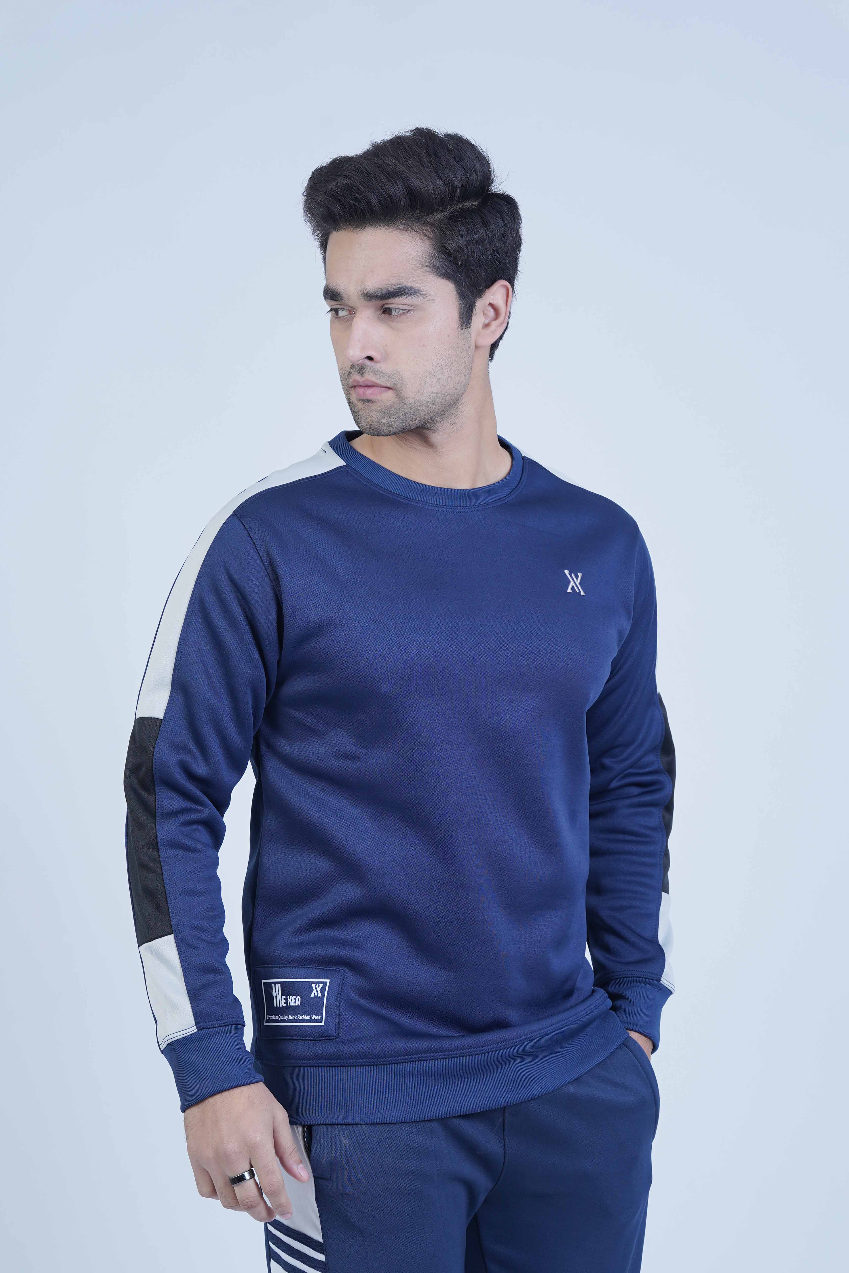 Classic navy crewneck with stylish stripes in ash grey and black along the sleeves, offering a contemporary twist.