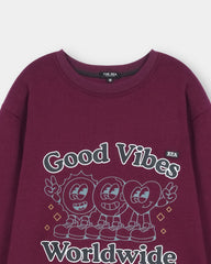 Maroon sweatshirt with 'Good Vibes Worldwide' text and cartoon characters on a white background